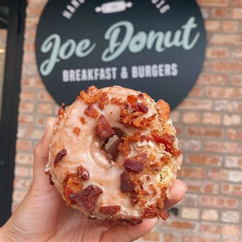 Joe's donuts - Joe Donut is located on the southeast corner of Milwaukee Ave. and W. Harts Rd. There is parking in the lot in the rear and there is some outside seating by the rear parking lot entrance. We ordered a half dozen donuts, but after perusing ...